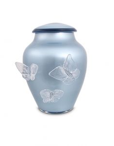 Urne en cristal avec papillons bleu